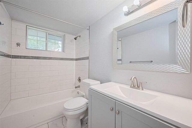 3602 Castledale Dr, Houston, TX 77093 - bathroom with vanity,  shower combination, a textured wall, and marble finish flooring