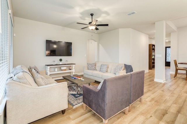 9806 Starry Night Ln, Manvel, TX 77578 - living area with light wood-style flooring and ceiling fan