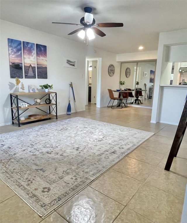 3300 Pebblebrook Dr Unit 17, Seabrook, TX 77586 - living area featuring ceiling fan and tile patterned flooring