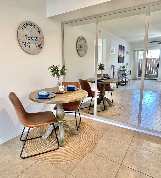 3300 Pebblebrook Dr Unit 17, Seabrook, TX 77586 - dining area featuring light tile patterned floors