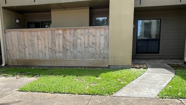 3300 Pebblebrook Dr Unit 17, Seabrook, TX 77586 - view of home's exterior with a lawn