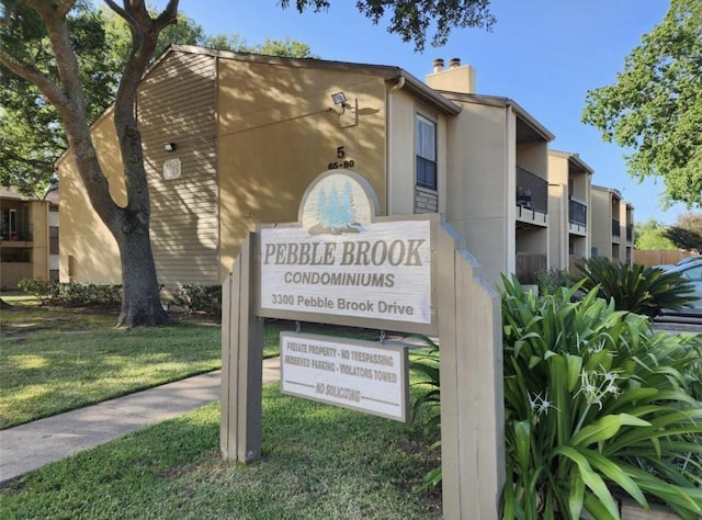 3300 Pebblebrook Dr Unit 17, Seabrook, TX 77586 - community sign with a lawn