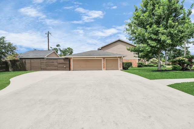 346 Ballantrae Ln, Houston, TX 77015 - view of front of house featuring brick siding, concrete driveway, and an attached garage