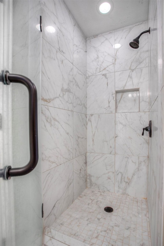 2115 Greentree Dr, Huntsville, TX 77340 - full bath featuring a marble finish shower
