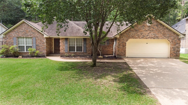 2115 Greentree Dr, Huntsville, TX 77340 - ranch-style house with an attached garage, concrete driveway, a front lawn, brick siding, and roof with shingles