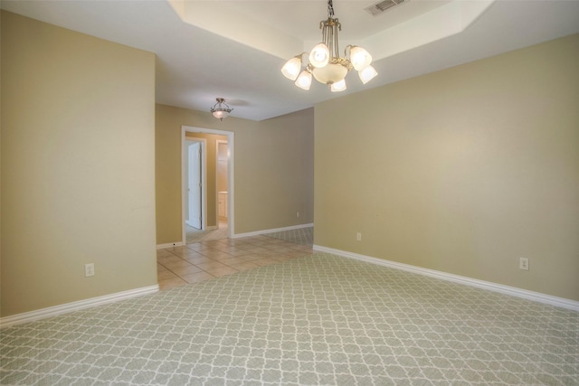 2115 Greentree Dr, Huntsville, TX 77340 - empty room with a chandelier, light carpet, and light tile patterned flooring