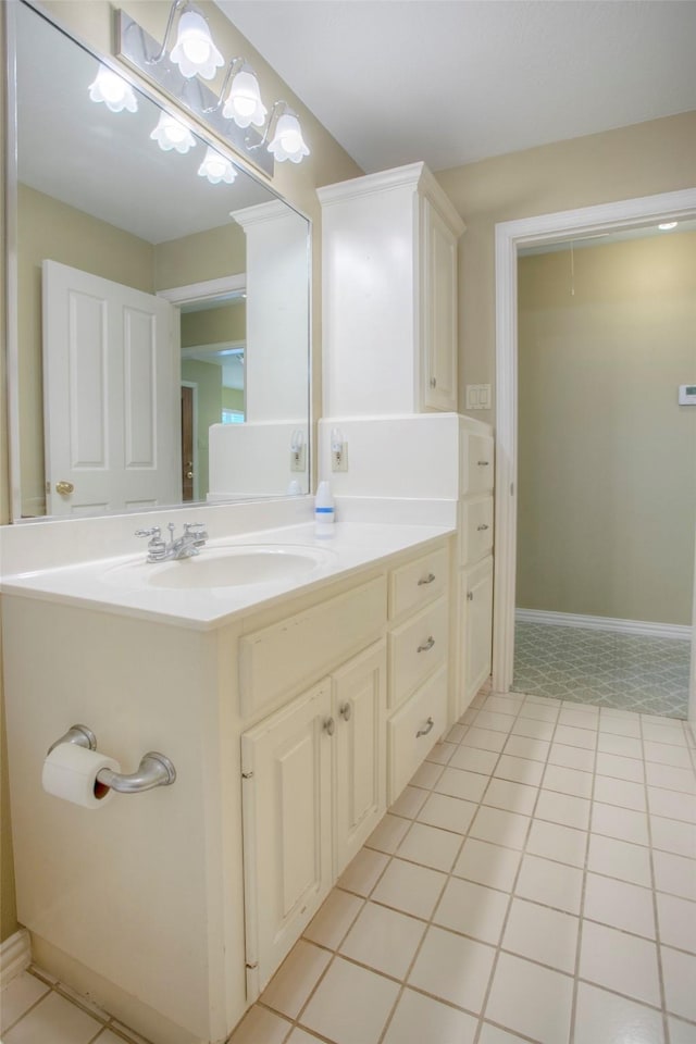 2115 Greentree Dr, Huntsville, TX 77340 - bathroom with vanity and baseboards
