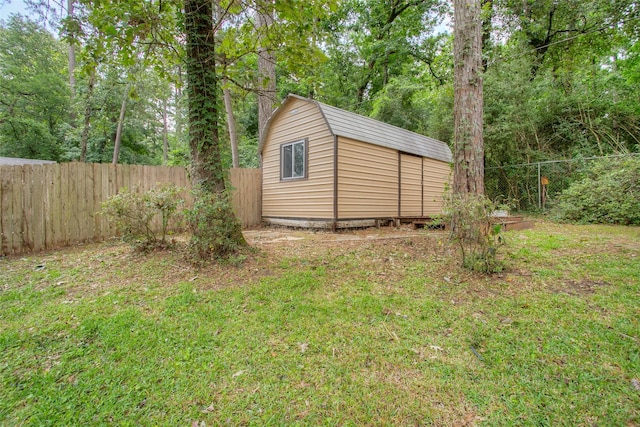 2115 Greentree Dr, Huntsville, TX 77340 - fenced backyard with a storage unit