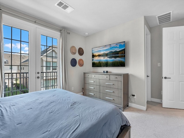 9440 Caddo Ridge Ln, Cypress, TX 77433 - bedroom featuring carpet flooring, access to exterior, and french doors