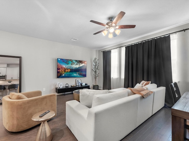 9440 Caddo Ridge Ln, Cypress, TX 77433 - living area with ceiling fan and wood finished floors