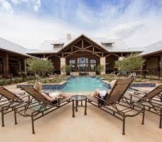 9440 Caddo Ridge Ln, Cypress, TX 77433 - outdoor pool featuring a patio area
