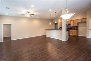 3510 Indian Mound Trl, Crosby, TX 77532 - unfurnished living room featuring ceiling fan, dark wood-style flooring, and recessed lighting