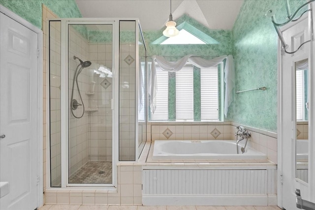 110 Crimson Bay Dr, League City, TX 77573 - bathroom featuring a stall shower, a garden tub, lofted ceiling, and radiator heating unit