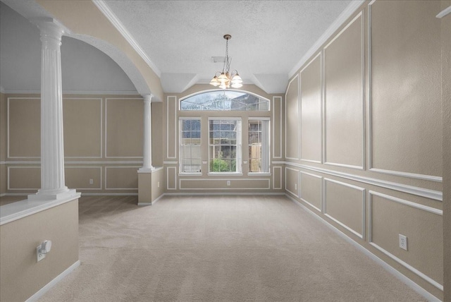 110 Crimson Bay Dr, League City, TX 77573 - unfurnished dining area featuring a decorative wall, decorative columns, light carpet, arched walkways, and a chandelier