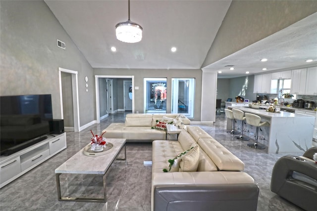 15902 Seven Springs Dr, Houston, TX 77084 - living room featuring high vaulted ceiling and recessed lighting