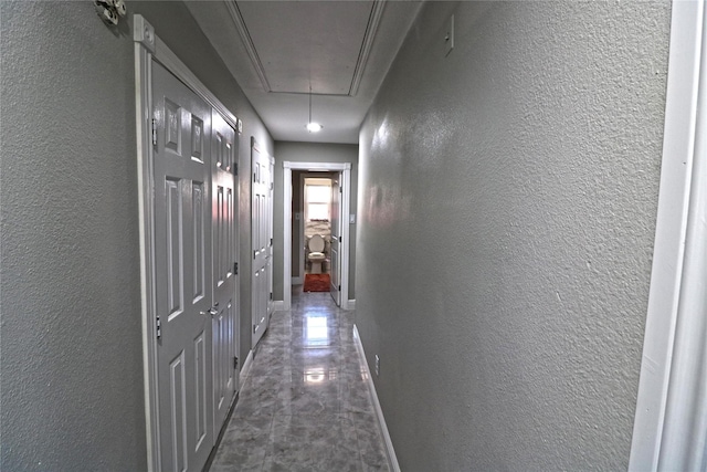 15902 Seven Springs Dr, Houston, TX 77084 - hall with attic access and a textured wall