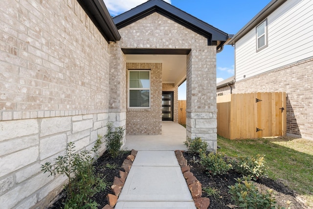 5827 Fresh View Ct, Katy, TX 77493 - doorway to property with brick siding and a gate