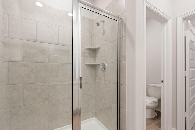 5827 Fresh View Ct, Katy, TX 77493 - full bathroom with a stall shower and wood finished floors
