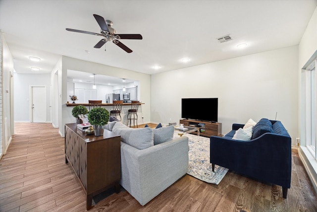 2612 Yupon St, Houston, TX 77006 - living area featuring wood finished floors and a ceiling fan