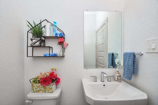3819 Ethan Park Ct, Katy, TX 77494 - half bathroom with a sink and toilet