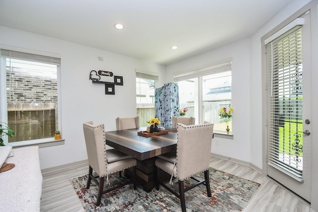 3819 Ethan Park Ct, Katy, TX 77494 - dining space with light wood-style flooring and recessed lighting