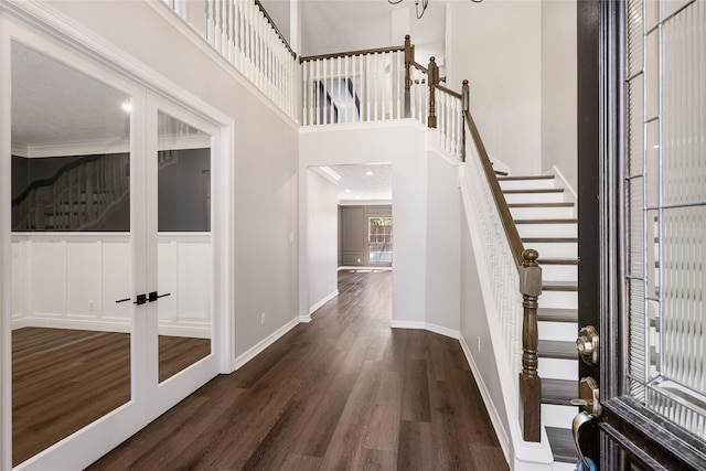 12014 Via Davinci Ln NW, Cypress, TX 77429 - foyer with dark wood finished floors, stairs, french doors, and a high ceiling