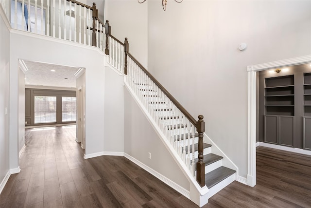 12014 Via Davinci Ln NW, Cypress, TX 77429 - stairway featuring wood finished floors and a high ceiling