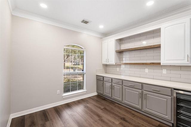 12014 Via Davinci Ln NW, Cypress, TX 77429 - kitchen featuring gray cabinetry, beverage cooler, dark wood-type flooring, backsplash, and open shelves