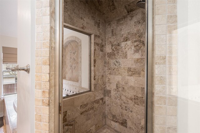 12014 Via Davinci Ln NW, Cypress, TX 77429 - full bathroom featuring tiled shower