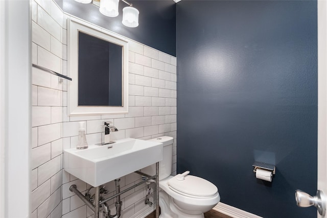 12014 Via Davinci Ln NW, Cypress, TX 77429 - half bathroom featuring toilet and tile walls