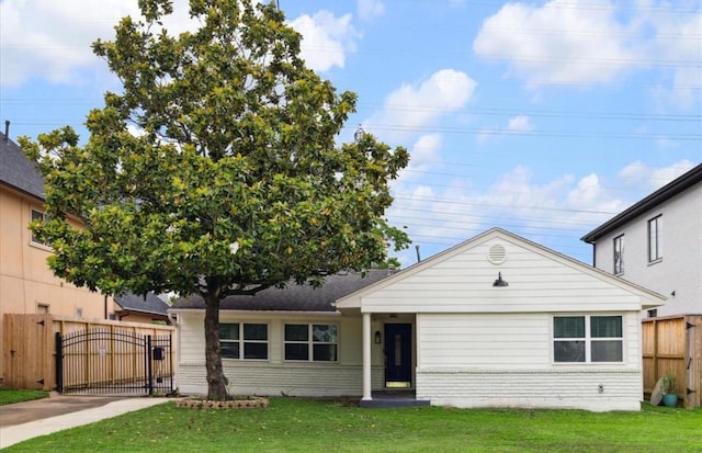 3818 Childress St, Houston, TX 77005 - view of front of house featuring a gate and brick siding