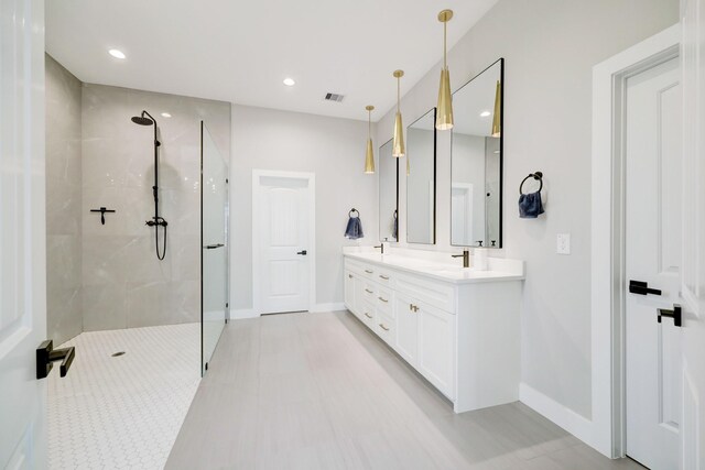 13 Rd 66111, Dayton, TX 77535 - bathroom featuring a walk in shower, double vanity, and recessed lighting