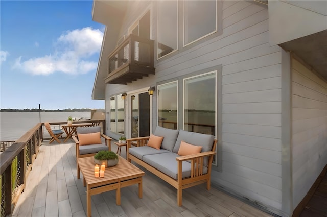 426 Apollo Dr, Livingston, TX 77351 - wooden terrace featuring an outdoor hangout area and a water view