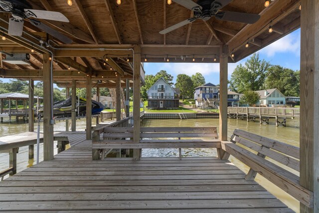426 Apollo Dr, Livingston, TX 77351 - dock area with a water view, boat lift, and a residential view