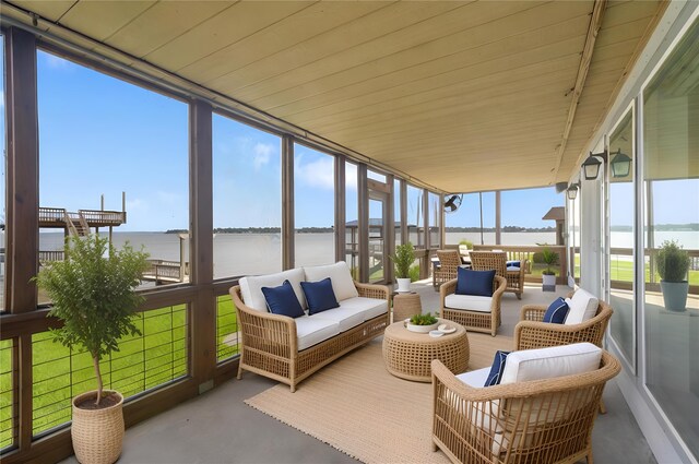 426 Apollo Dr, Livingston, TX 77351 - sunroom with a water view and an outdoor living space