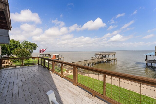 426 Apollo Dr, Livingston, TX 77351 - wooden deck with a water view