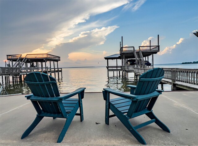 426 Apollo Dr, Livingston, TX 77351 - dock featuring a water view and boat lift