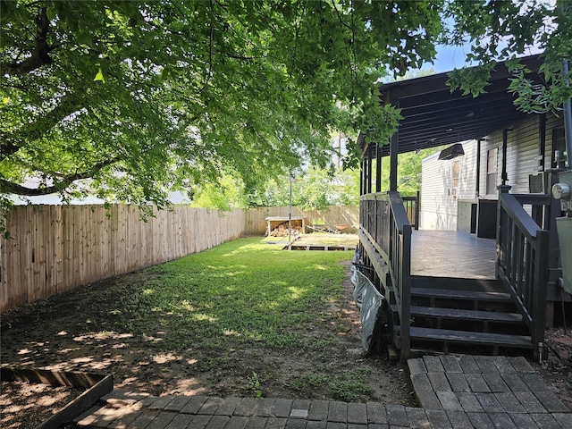 11670 Vistawood St, Willis, TX 77318 - fenced backyard with a deck