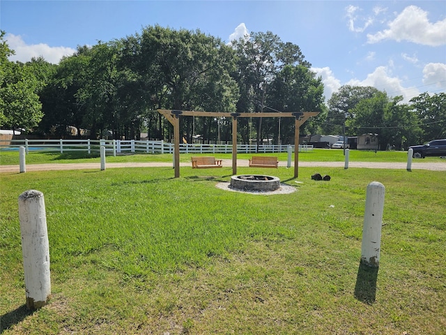 11670 Vistawood St, Willis, TX 77318 - surrounding community featuring an outdoor fire pit