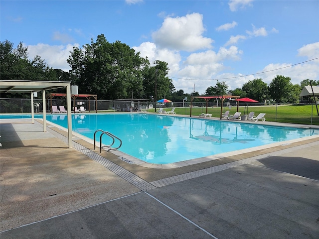 11670 Vistawood St, Willis, TX 77318 - community pool with a patio
