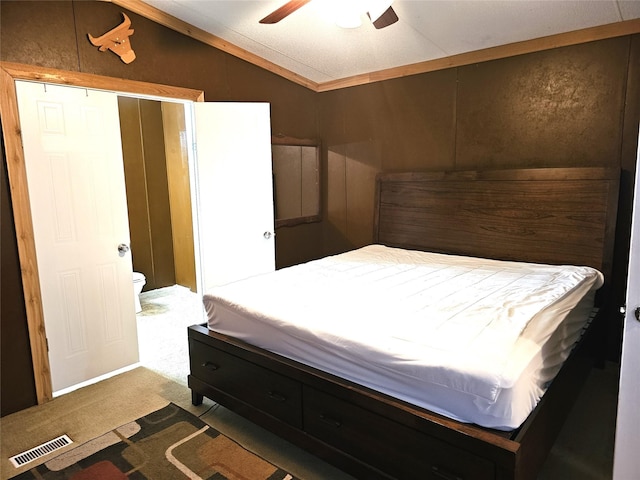 11670 Vistawood St, Willis, TX 77318 - carpeted bedroom featuring vaulted ceiling and ceiling fan