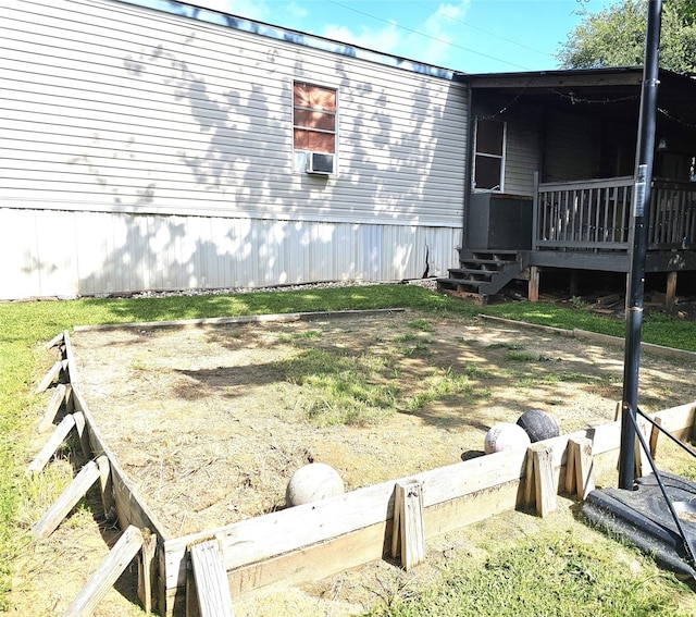 11670 Vistawood St, Willis, TX 77318 - view of side of property with a wooden deck and cooling unit