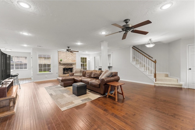 27277 Wells Ln, Conroe, TX 77385 - living room featuring a ceiling fan, stairs, hardwood / wood-style flooring, and recessed lighting