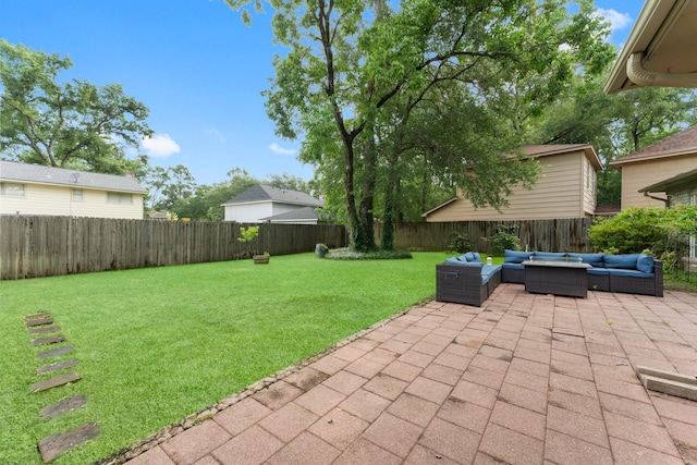 27277 Wells Ln, Conroe, TX 77385 - fenced backyard with outdoor lounge area and a patio