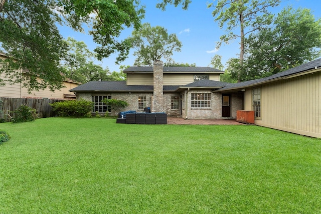 27277 Wells Ln, Conroe, TX 77385 - back of property with a chimney, a patio area, an outdoor hangout area, brick siding, and a shingled roof