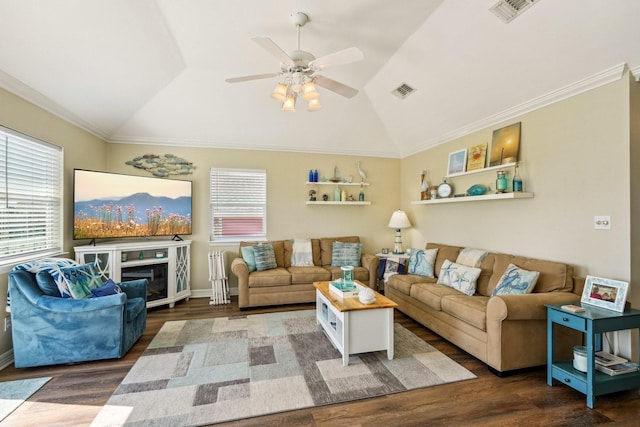 22123 Yoakum Dr, Galveston, TX 77554 - living area with vaulted ceiling, wood finished floors, a ceiling fan, and crown molding