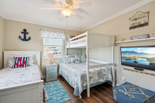 22123 Yoakum Dr, Galveston, TX 77554 - bedroom with dark wood finished floors, crown molding, and ceiling fan