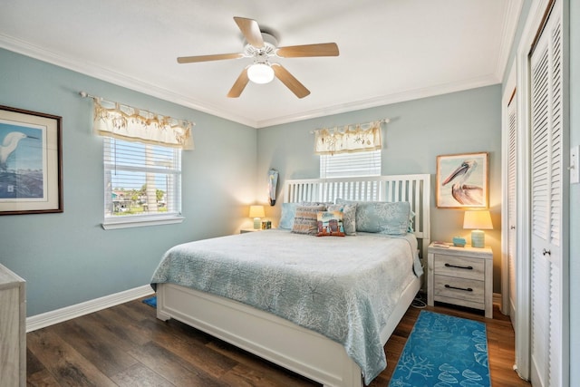 22123 Yoakum Dr, Galveston, TX 77554 - bedroom featuring multiple windows, ornamental molding, dark wood-type flooring, and ceiling fan
