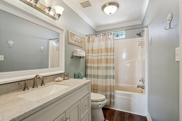 22123 Yoakum Dr, Galveston, TX 77554 - full bathroom with vanity, shower / tub combo, crown molding, and wood finished floors