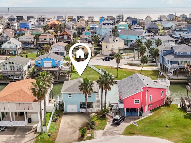 22123 Yoakum Dr, Galveston, TX 77554 - aerial view of residential area featuring a large body of water